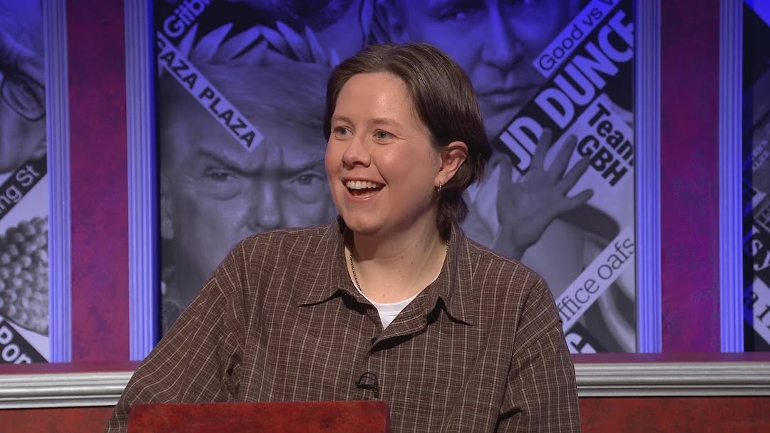 Chloe Petts smiles while seated, wearing a brown checked shirt, against a backdrop of various images.